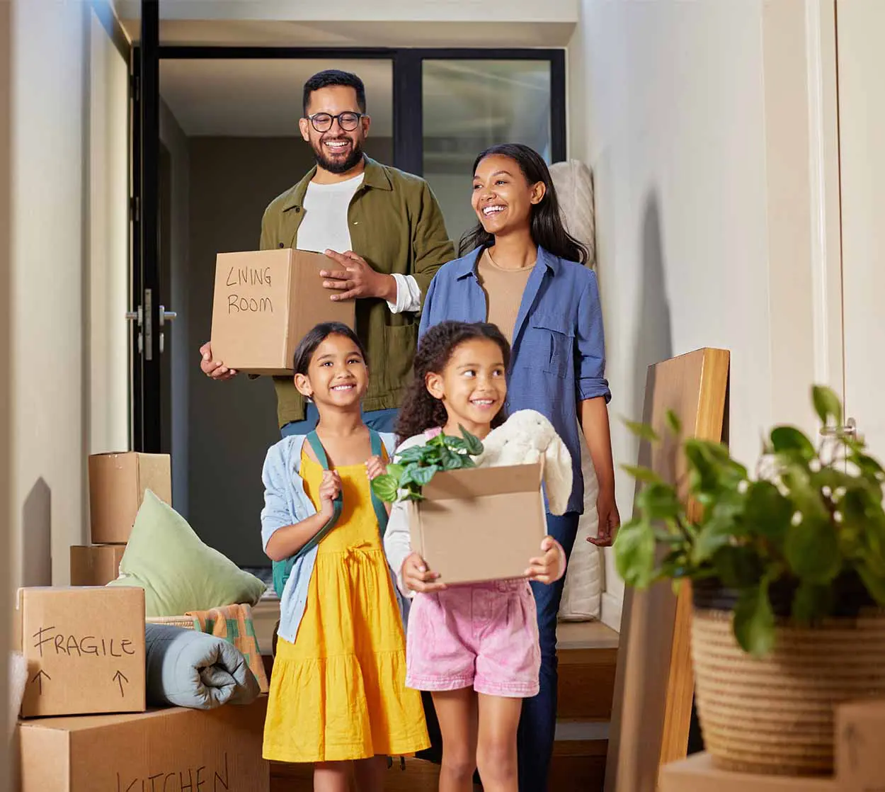 A happy family relocating internationally to a new country by following the 7 step guide